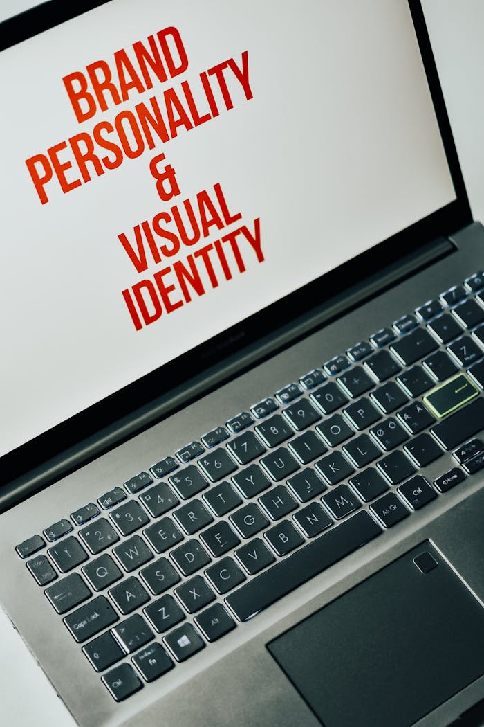 about-me-img Laptop screen showing text on brand personality and visual identity for marketing strategy.